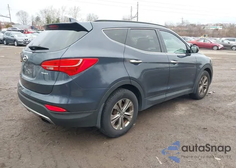 2014 Hyundai Santa Fe Sport 2.4L z USA, uszkodzony, nr VIN 5XYZU3LB5EG157888